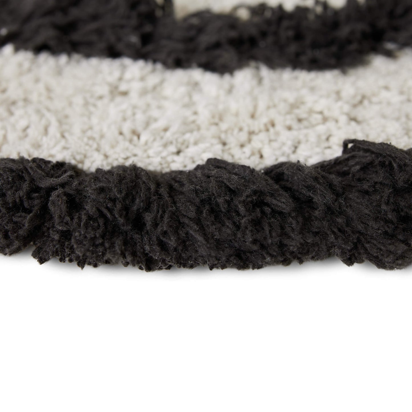 Tapis shaggy rond M - Noir & écru