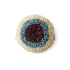 Coussin fourrure "Eye Catcher"