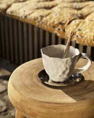 Tabouret bois brut sculpté